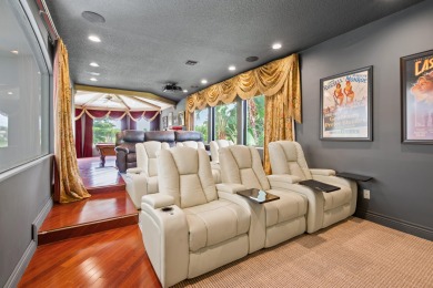 Experience breathtaking long lake views from this grand estate on St. Andrews Country Club of Boca Raton in Florida - for sale on GolfHomes.com, golf home, golf lot