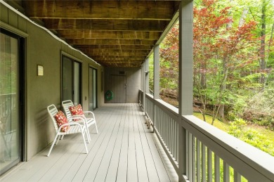 Discover a captivating retreat in Holly Forest with this classic on Sapphire National Golf Club in North Carolina - for sale on GolfHomes.com, golf home, golf lot