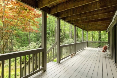 Discover a captivating retreat in Holly Forest with this classic on Sapphire National Golf Club in North Carolina - for sale on GolfHomes.com, golf home, golf lot