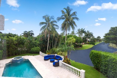 Experience breathtaking long lake views from this grand estate on St. Andrews Country Club of Boca Raton in Florida - for sale on GolfHomes.com, golf home, golf lot