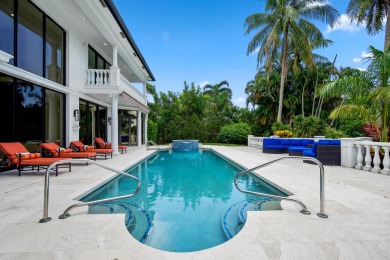 Experience breathtaking long lake views from this grand estate on St. Andrews Country Club of Boca Raton in Florida - for sale on GolfHomes.com, golf home, golf lot