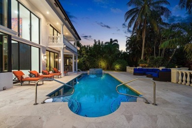 Experience breathtaking long lake views from this grand estate on St. Andrews Country Club of Boca Raton in Florida - for sale on GolfHomes.com, golf home, golf lot