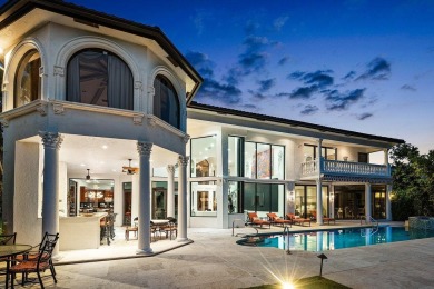 Experience breathtaking long lake views from this grand estate on St. Andrews Country Club of Boca Raton in Florida - for sale on GolfHomes.com, golf home, golf lot