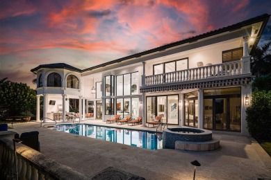 Experience breathtaking long lake views from this grand estate on St. Andrews Country Club of Boca Raton in Florida - for sale on GolfHomes.com, golf home, golf lot