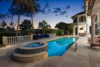 Experience breathtaking long lake views from this grand estate on St. Andrews Country Club of Boca Raton in Florida - for sale on GolfHomes.com, golf home, golf lot