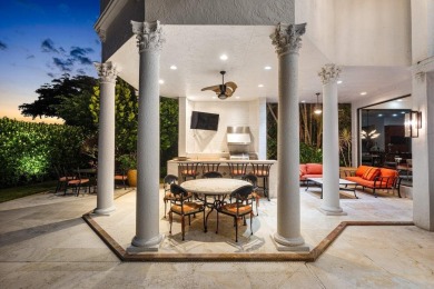 Experience breathtaking long lake views from this grand estate on St. Andrews Country Club of Boca Raton in Florida - for sale on GolfHomes.com, golf home, golf lot