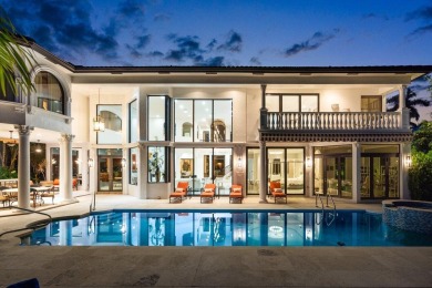 Experience breathtaking long lake views from this grand estate on St. Andrews Country Club of Boca Raton in Florida - for sale on GolfHomes.com, golf home, golf lot