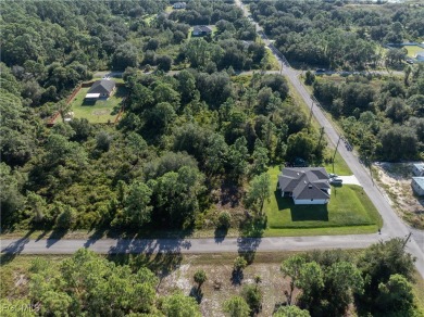 Great Investment! .5 Acre Almost Cleared Lot on Paved Road in on Lehigh Resort Club in Florida - for sale on GolfHomes.com, golf home, golf lot