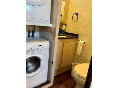 A luxury RV on a lot with a fantastic view and complete on Rancho California RV Resort in California - for sale on GolfHomes.com, golf home, golf lot
