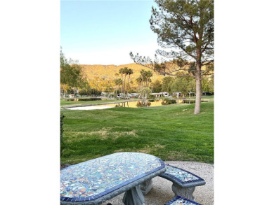 A luxury RV on a lot with a fantastic view and complete on Rancho California RV Resort in California - for sale on GolfHomes.com, golf home, golf lot