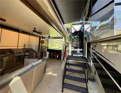 A luxury RV on a lot with a fantastic view and complete on Rancho California RV Resort in California - for sale on GolfHomes.com, golf home, golf lot