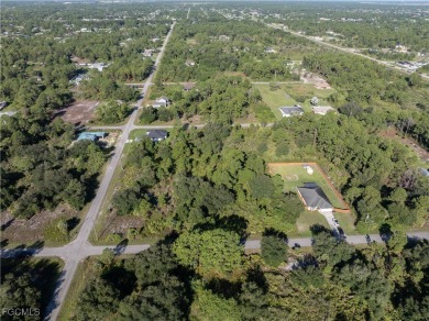 Great Investment! .5 Acre Almost Cleared Lot on Paved Road in on Lehigh Resort Club in Florida - for sale on GolfHomes.com, golf home, golf lot