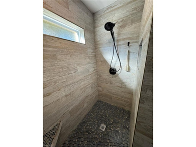 NEW ROOF 2023, NEW PLUMBING 2026, POOL CAGE 2023, HURRICANE on Fountain Lakes Community Golf Course in Florida - for sale on GolfHomes.com, golf home, golf lot