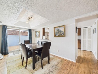 Spacious 2,028 sq ft Spanish Mediterranean-style townhome on Desert Hawk At Pueblo West in Colorado - for sale on GolfHomes.com, golf home, golf lot