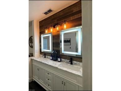 NEW ROOF 2023, NEW PLUMBING 2026, POOL CAGE 2023, HURRICANE on Fountain Lakes Community Golf Course in Florida - for sale on GolfHomes.com, golf home, golf lot