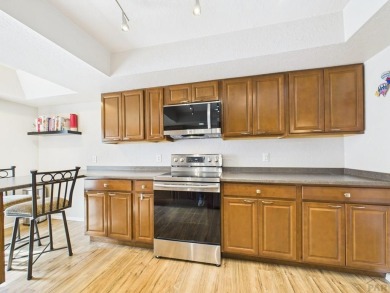Spacious 2,028 sq ft Spanish Mediterranean-style townhome on Desert Hawk At Pueblo West in Colorado - for sale on GolfHomes.com, golf home, golf lot