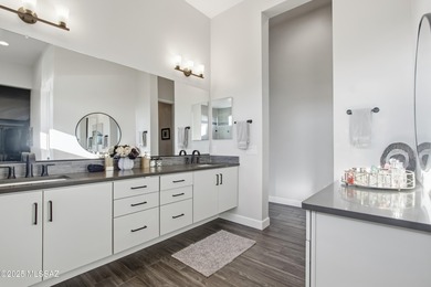 This exceptional, former Fairfield model home blends elevated on Omni Tucson National Golf Resort and Spa - Catalina in Arizona - for sale on GolfHomes.com, golf home, golf lot