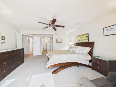 Spacious 2,028 sq ft Spanish Mediterranean-style townhome on Desert Hawk At Pueblo West in Colorado - for sale on GolfHomes.com, golf home, golf lot