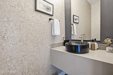 This exceptional, former Fairfield model home blends elevated on Omni Tucson National Golf Resort and Spa - Catalina in Arizona - for sale on GolfHomes.com, golf home, golf lot