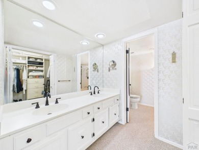 Spacious 2,028 sq ft Spanish Mediterranean-style townhome on Desert Hawk At Pueblo West in Colorado - for sale on GolfHomes.com, golf home, golf lot