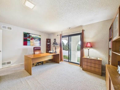 Spacious 2,028 sq ft Spanish Mediterranean-style townhome on Desert Hawk At Pueblo West in Colorado - for sale on GolfHomes.com, golf home, golf lot
