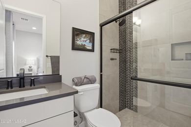 This exceptional, former Fairfield model home blends elevated on Omni Tucson National Golf Resort and Spa - Catalina in Arizona - for sale on GolfHomes.com, golf home, golf lot