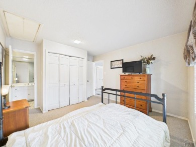 Spacious 2,028 sq ft Spanish Mediterranean-style townhome on Desert Hawk At Pueblo West in Colorado - for sale on GolfHomes.com, golf home, golf lot
