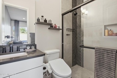 This exceptional, former Fairfield model home blends elevated on Omni Tucson National Golf Resort and Spa - Catalina in Arizona - for sale on GolfHomes.com, golf home, golf lot