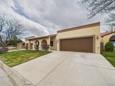 Spacious 2,028 sq ft Spanish Mediterranean-style townhome on Desert Hawk At Pueblo West in Colorado - for sale on GolfHomes.com, golf home, golf lot