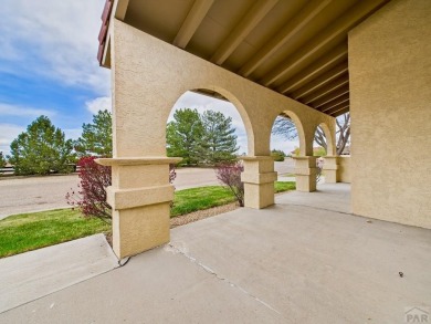 Spacious 2,028 sq ft Spanish Mediterranean-style townhome on Desert Hawk At Pueblo West in Colorado - for sale on GolfHomes.com, golf home, golf lot