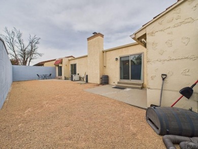 Spacious 2,028 sq ft Spanish Mediterranean-style townhome on Desert Hawk At Pueblo West in Colorado - for sale on GolfHomes.com, golf home, golf lot
