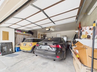 Spacious 2,028 sq ft Spanish Mediterranean-style townhome on Desert Hawk At Pueblo West in Colorado - for sale on GolfHomes.com, golf home, golf lot