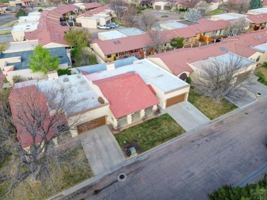 Spacious 2,028 sq ft Spanish Mediterranean-style townhome on Desert Hawk At Pueblo West in Colorado - for sale on GolfHomes.com, golf home, golf lot