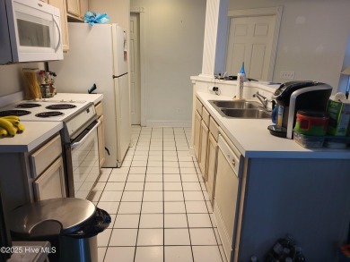 Priced over $20,000 below similar units--this ground-floor on Brunswick Plantation and Golf Resorts in North Carolina - for sale on GolfHomes.com, golf home, golf lot