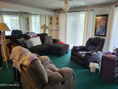 Priced over $20,000 below similar units--this ground-floor on Brunswick Plantation and Golf Resorts in North Carolina - for sale on GolfHomes.com, golf home, golf lot