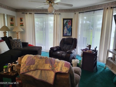 Priced over $20,000 below similar units--this ground-floor on Brunswick Plantation and Golf Resorts in North Carolina - for sale on GolfHomes.com, golf home, golf lot