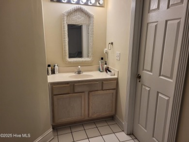 Priced over $20,000 below similar units--this ground-floor on Brunswick Plantation and Golf Resorts in North Carolina - for sale on GolfHomes.com, golf home, golf lot