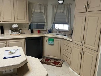 Charming and Light-Filled - This Beautiful Home Boasts an on Four Lakes Golf Club in Florida - for sale on GolfHomes.com, golf home, golf lot