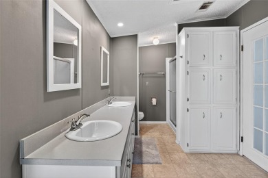 This beautiful open floorplan 2 bedroom/2 bath overlooks some of on Zellwood Station Country Club in Florida - for sale on GolfHomes.com, golf home, golf lot