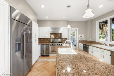 Perfectly positioned on the fairway, this elegant estate offers on Spanish Trail Golf and Country Club in Nevada - for sale on GolfHomes.com, golf home, golf lot