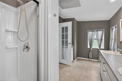 This beautiful open floorplan 2 bedroom/2 bath overlooks some of on Zellwood Station Country Club in Florida - for sale on GolfHomes.com, golf home, golf lot