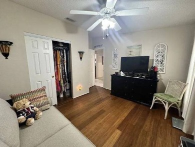 Charming and Light-Filled - This Beautiful Home Boasts an on Four Lakes Golf Club in Florida - for sale on GolfHomes.com, golf home, golf lot