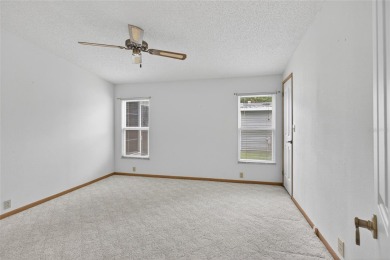 This beautiful open floorplan 2 bedroom/2 bath overlooks some of on Zellwood Station Country Club in Florida - for sale on GolfHomes.com, golf home, golf lot