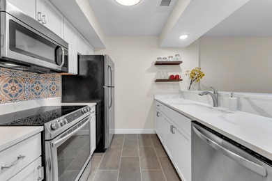 Gorgeous, bright, and freshly remodeled, this clean unit in the on Pointe Royale Village Country Club in Missouri - for sale on GolfHomes.com, golf home, golf lot