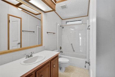 This beautiful open floorplan 2 bedroom/2 bath overlooks some of on Zellwood Station Country Club in Florida - for sale on GolfHomes.com, golf home, golf lot