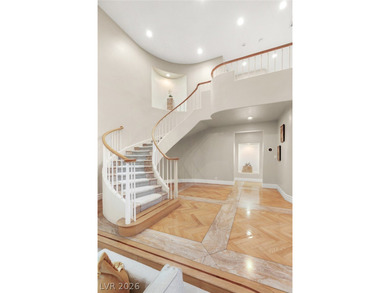 Perfectly positioned on the fairway, this elegant estate offers on Spanish Trail Golf and Country Club in Nevada - for sale on GolfHomes.com, golf home, golf lot