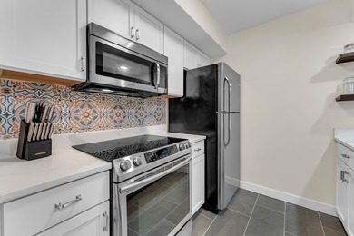 Gorgeous, bright, and freshly remodeled, this clean unit in the on Pointe Royale Village Country Club in Missouri - for sale on GolfHomes.com, golf home, golf lot