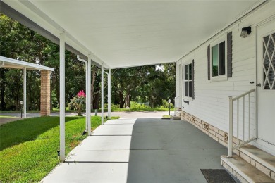 This beautiful open floorplan 2 bedroom/2 bath overlooks some of on Zellwood Station Country Club in Florida - for sale on GolfHomes.com, golf home, golf lot