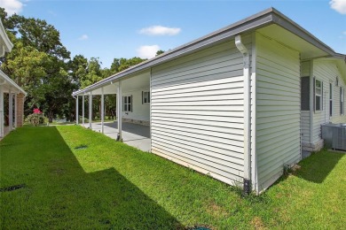This beautiful open floorplan 2 bedroom/2 bath overlooks some of on Zellwood Station Country Club in Florida - for sale on GolfHomes.com, golf home, golf lot