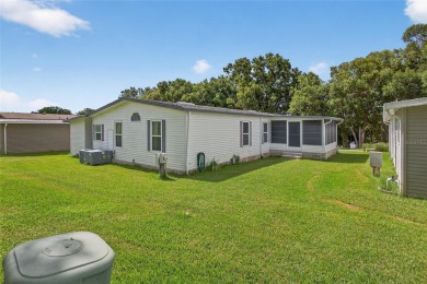 This beautiful open floorplan 2 bedroom/2 bath overlooks some of on Zellwood Station Country Club in Florida - for sale on GolfHomes.com, golf home, golf lot